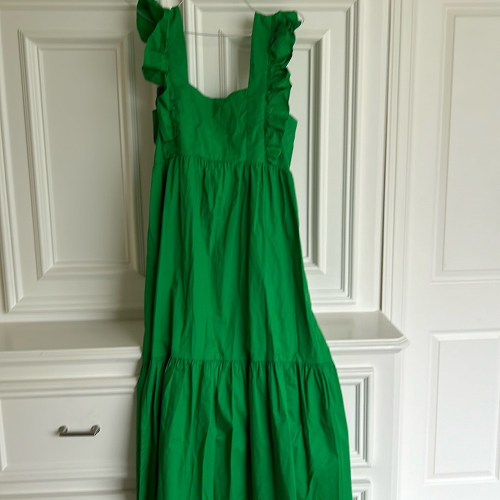 Adorable green sundress 49 inches long. 20 inches from pit to pit